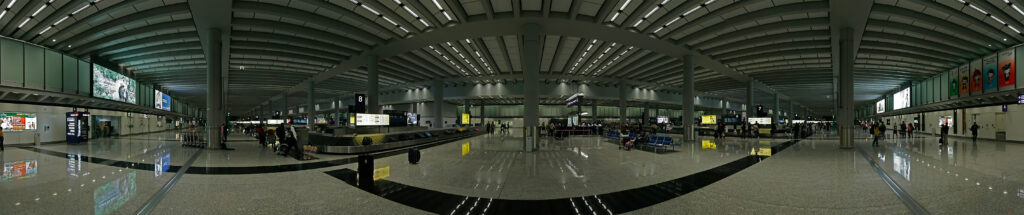 Área de reclamo de equipaje en aeropuerto internacional - derechos pasajero equipaje perdido dañado vuelo